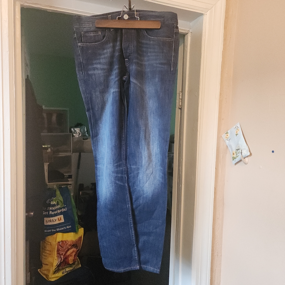 Acne Blue Denim Jeans with Brown Patch